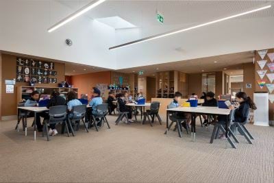 Photo of children in a classroom sitting at desks